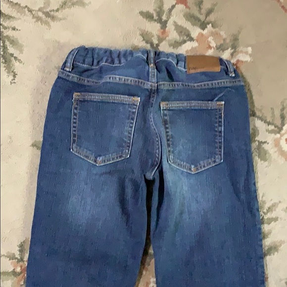 This is two pairs of jeans and a plaid shirt - Picture 6 of 8